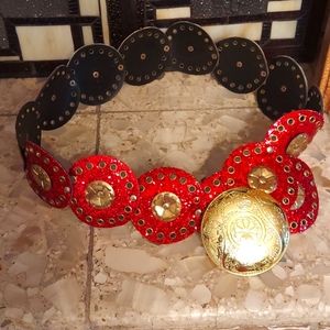 Red glitter medallion belt.